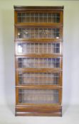 An oak six section Globe Wernicke bookcase with leaded glass, 87 x 29 x 200cms