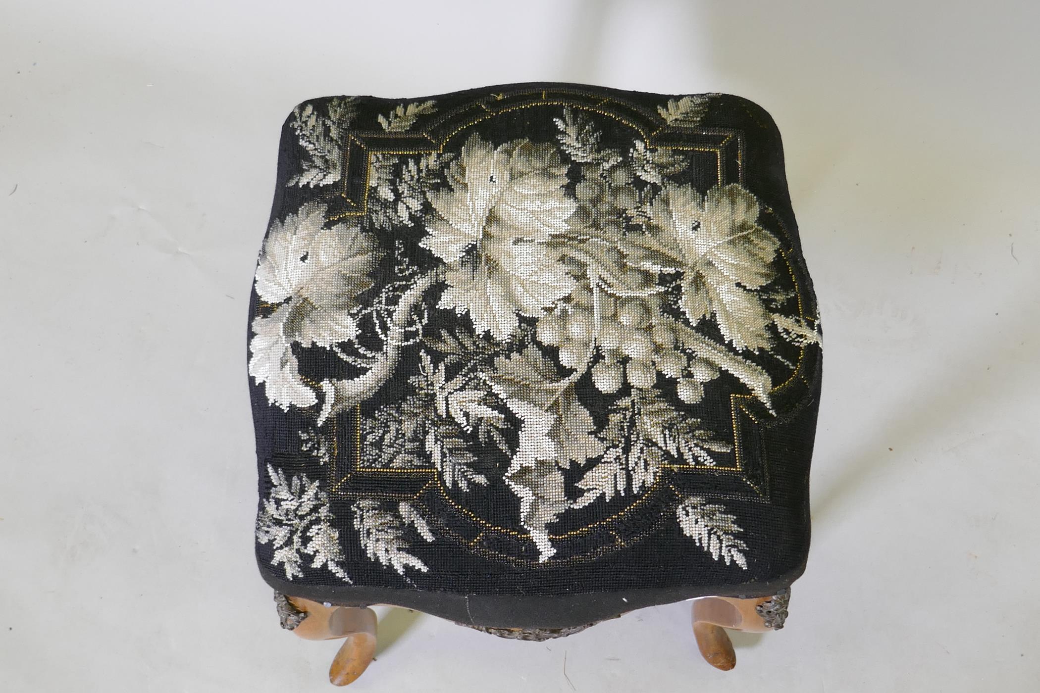 A C19th walnut stool with beadwork cover and ormolu mounts, raised on cabriole supports, AF, 39 x - Image 2 of 3