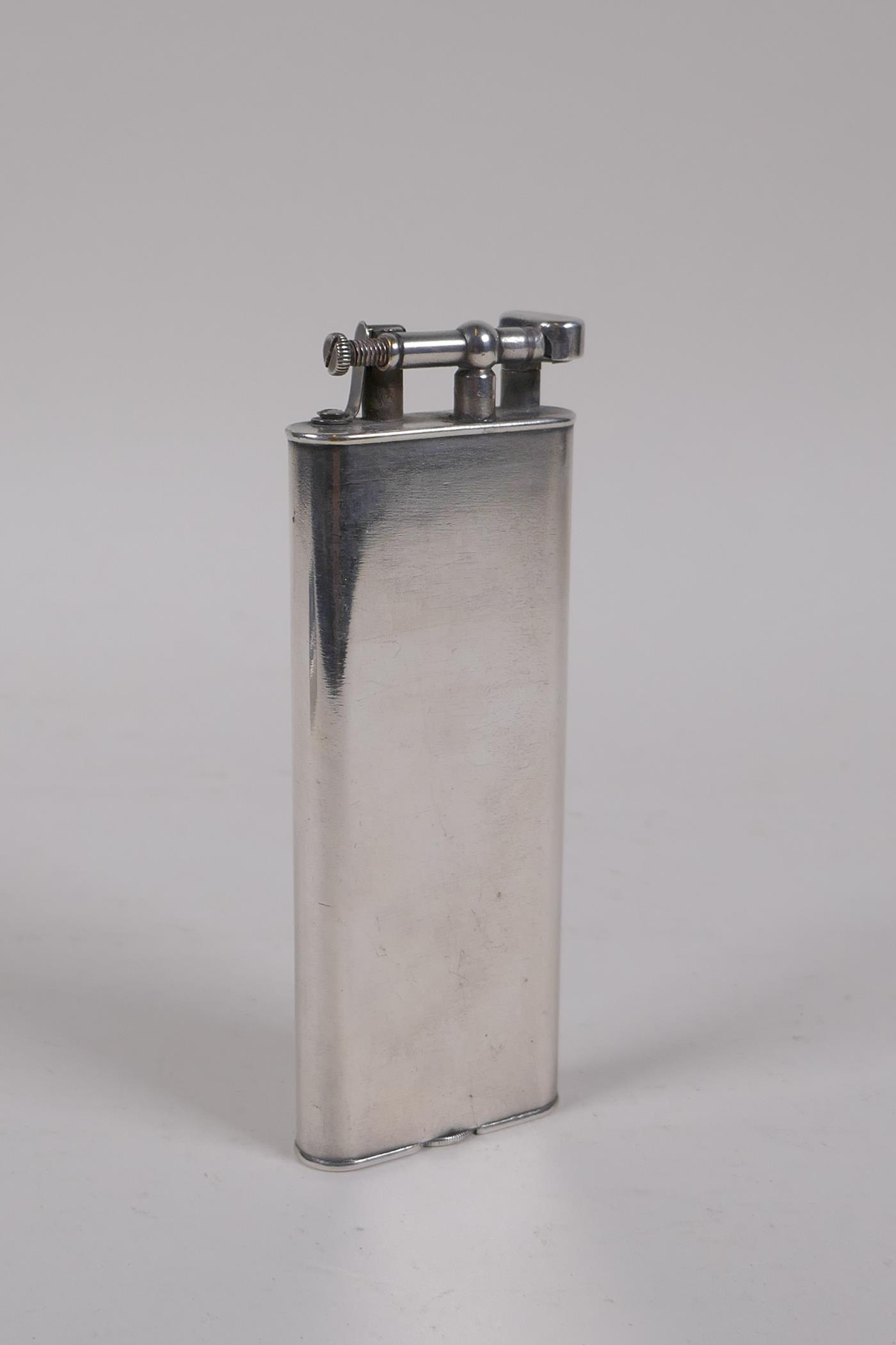 A W&G/Dunhill unique club size lighter, Pat.No. 143752, 12cm high Please note: buyers outside of the