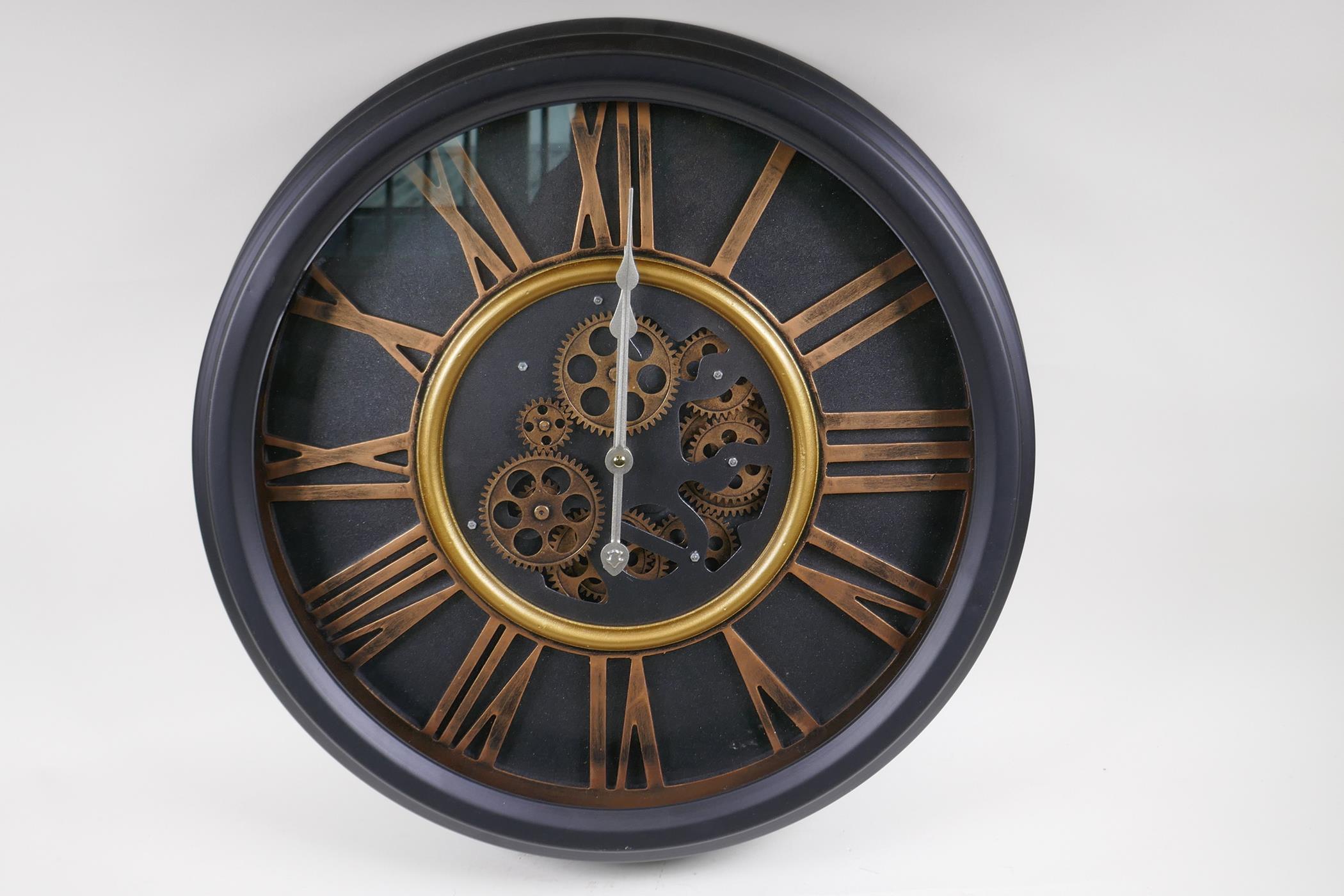 A wall clock with quartz movement and separately powered open cogwork, with bronzed Roman - Image 3 of 3