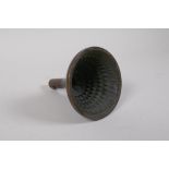 A Tibetan cast bronze Tsa Tsa Stupa mold, 9cm diameter