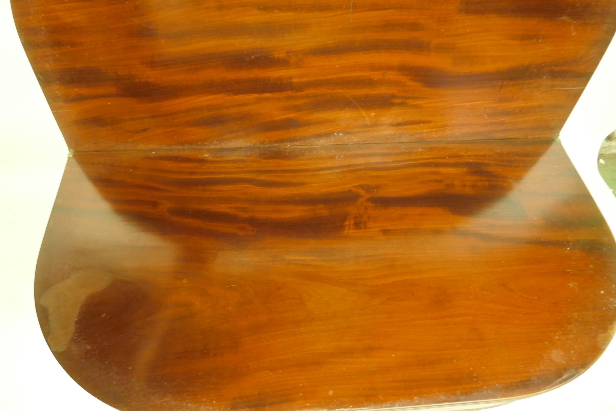 A Georgian mahogany D shaped tea table with reeded edge and cross-banded top, raised on carved sabre - Image 4 of 4