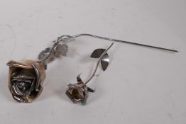 A hallmarked silver rose, London 1973, 78g, and another smaller marked 800, 14g