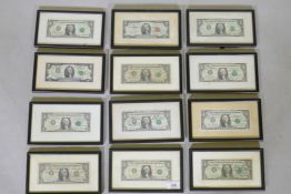 Twelve framed US dollar and two dollar notes, each 13 x 23cms