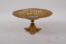 A C19th ormolu pierced tazza with an inset eglomise panel depicting crystal palace, 21cm diameter