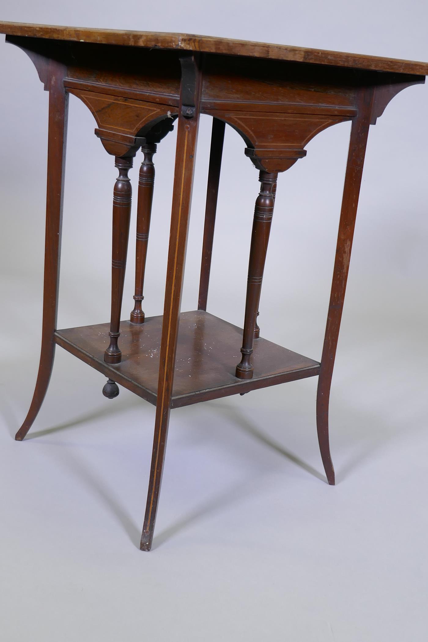 Victorian two tier rosewood occasional table, with boxwood lining, raised on sabre supports, one - Image 4 of 4