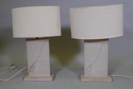A pair of ceramic table lamps, 32cm high, 52cm with shades