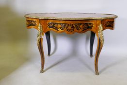 A late C19th/early C20th French kingwood and marquetry inlaid centre table, with ormolu mounts and