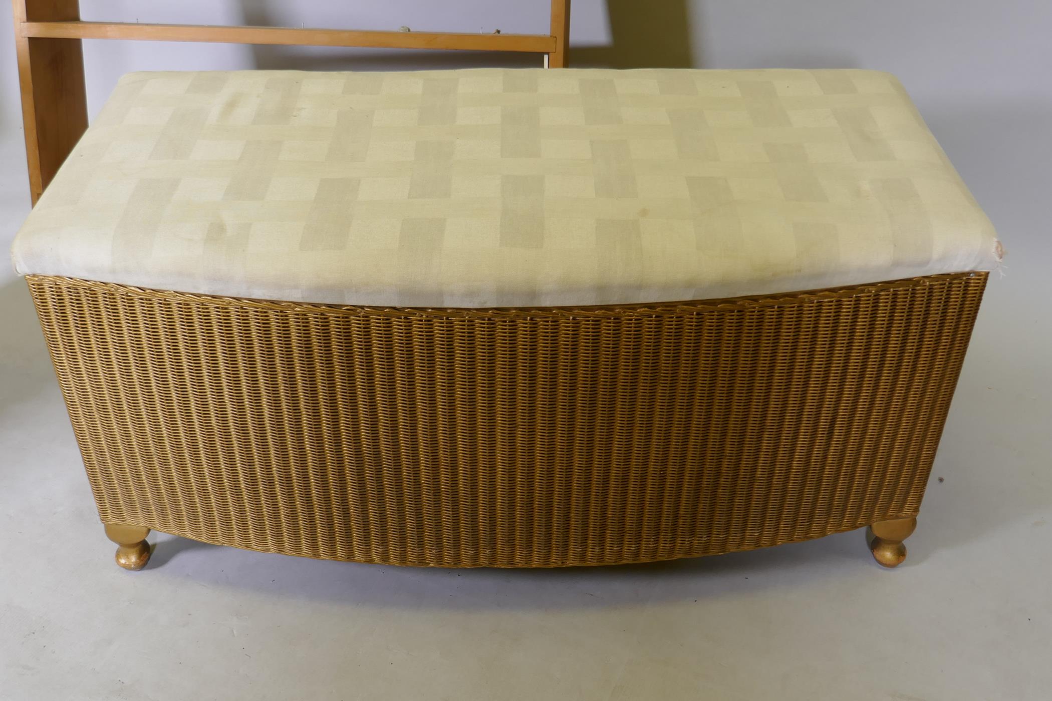 A Lloyd Loom Ottoman with upholstered seat, 90cm wide, and two pine shelf units - Image 4 of 5