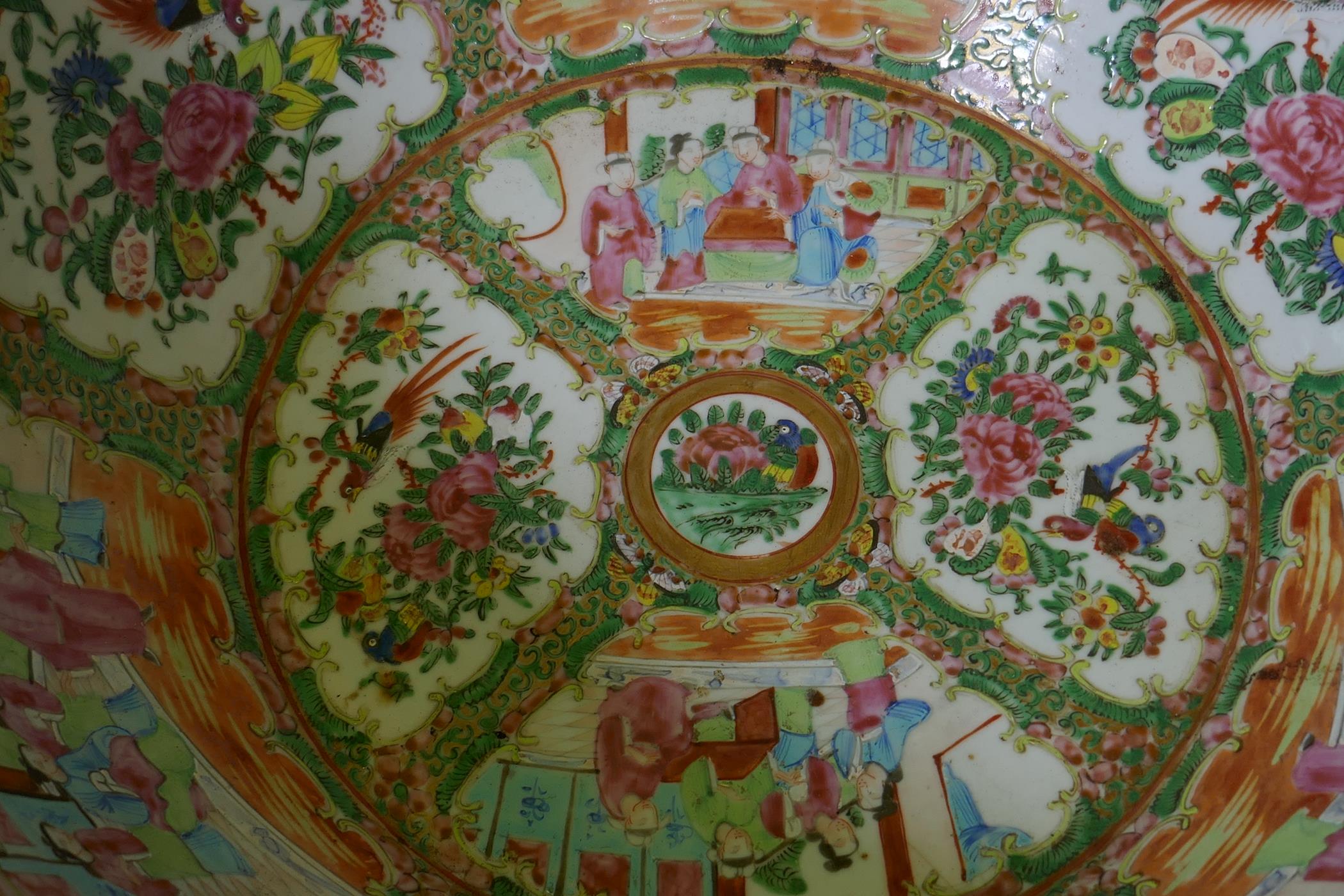 A C19th Cantonese famille rose ceramic bowl, decorated with birds, butterflies and figures, 47cm - Image 5 of 7