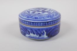 A blue and white porcelain cylinder box and cover with dragon decoration, Chinese Xuande 6 character