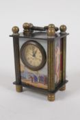 A miniature brass cased carriage clock, 4 x 3cms