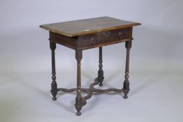 An C18th oak side table with single drawer, brass drop handles and curved X stretcher, 73 x 79 x