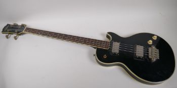 A vintage Japanese built Shaftesbury bass guitar with Les Paul shaped body, 110cm long