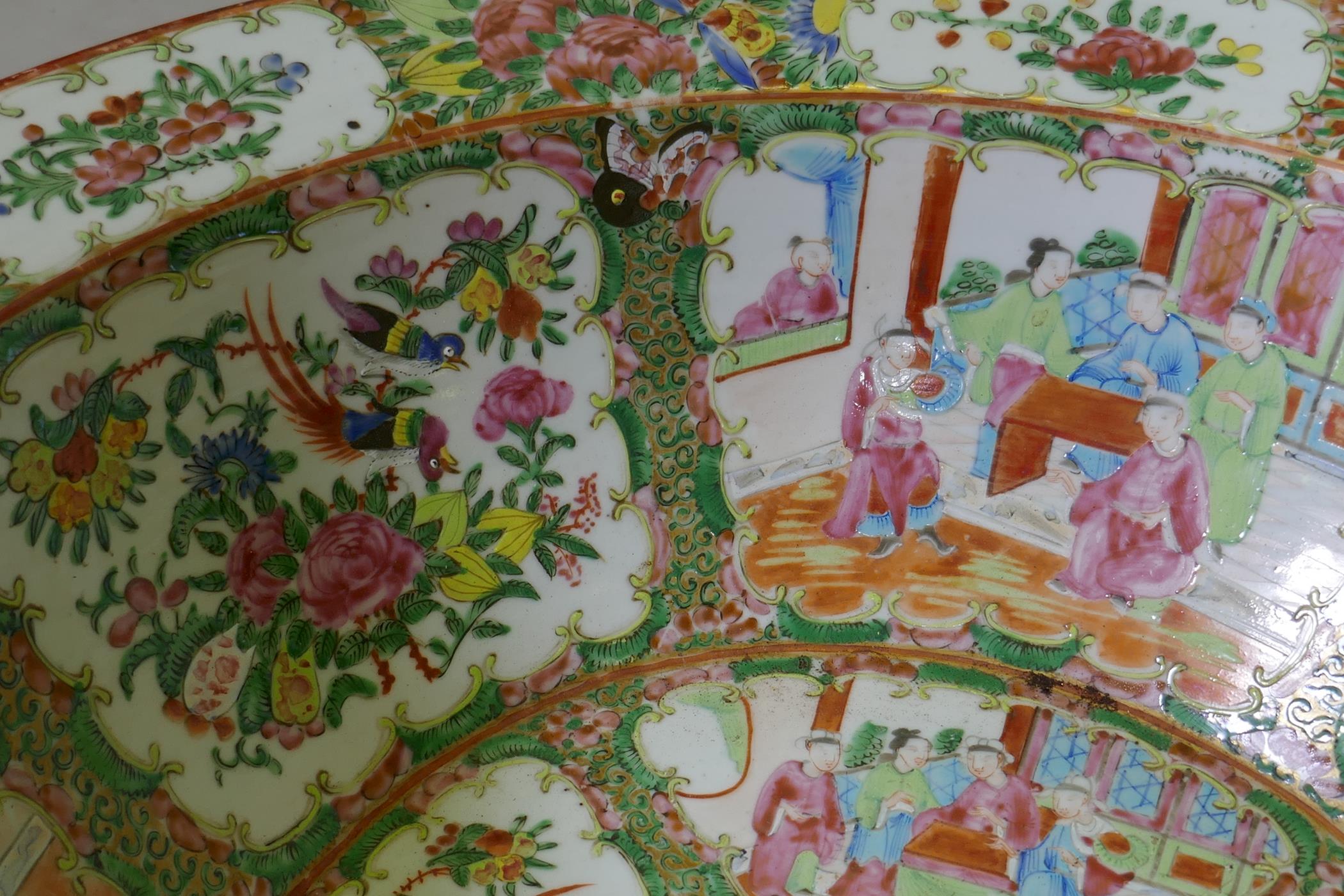 A C19th Cantonese famille rose ceramic bowl, decorated with birds, butterflies and figures, 47cm - Image 4 of 7