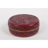 A Chinese cinnabar lacquer style box and over with brass edge, 6 character mark to base, 10cm