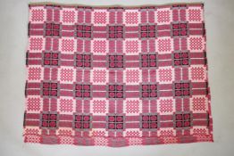 A vintage Welsh red ground wool blanket with Caernafon portcullis design, 140 x 215cms