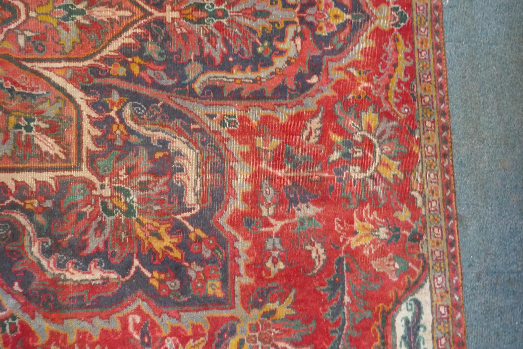 A Persian heavy pile red ground vintage Heriz carpet, Northern Iran tradition floral pattern, - Image 3 of 6