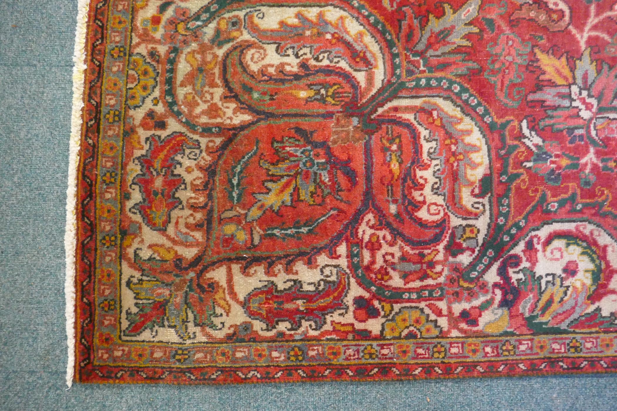 A Persian heavy pile red ground vintage Heriz carpet, Northern Iran tradition floral pattern, - Image 5 of 6