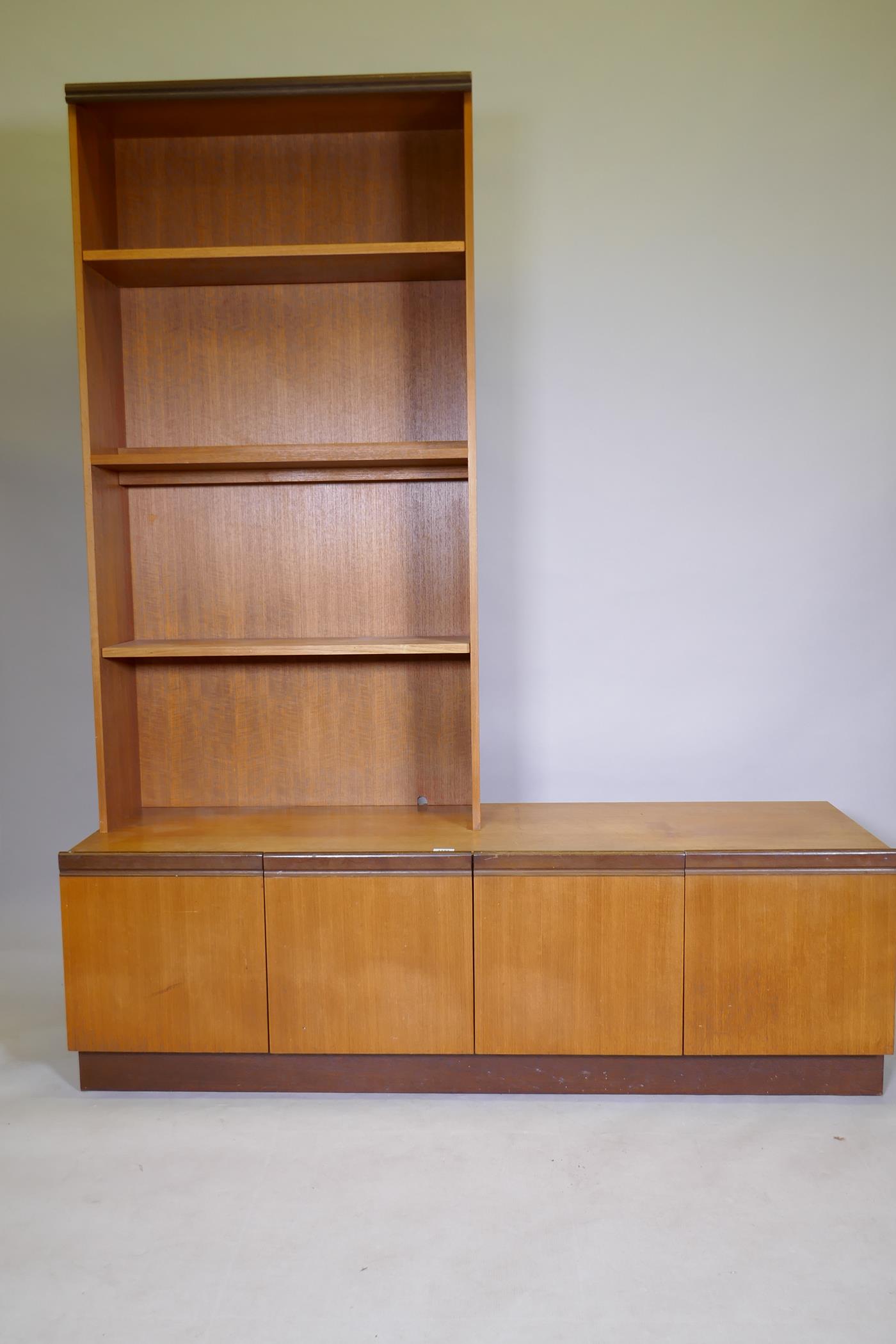 A mid century G Plan teak modular wall system / shelving system, consisting of a base unit and