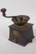 A vintage patent coffee mill by A. Kenrick & Sons, 12cm square