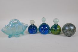 Three Mdina glass ball paperweights, largest 10cm high, an ABC paperweight, and a Davidson