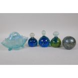 Three Mdina glass ball paperweights, largest 10cm high, an ABC paperweight, and a Davidson