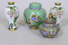 A Chinese cloisonne jar and cover with dragon decoration, 16cm high, and a pair of vases and a pot