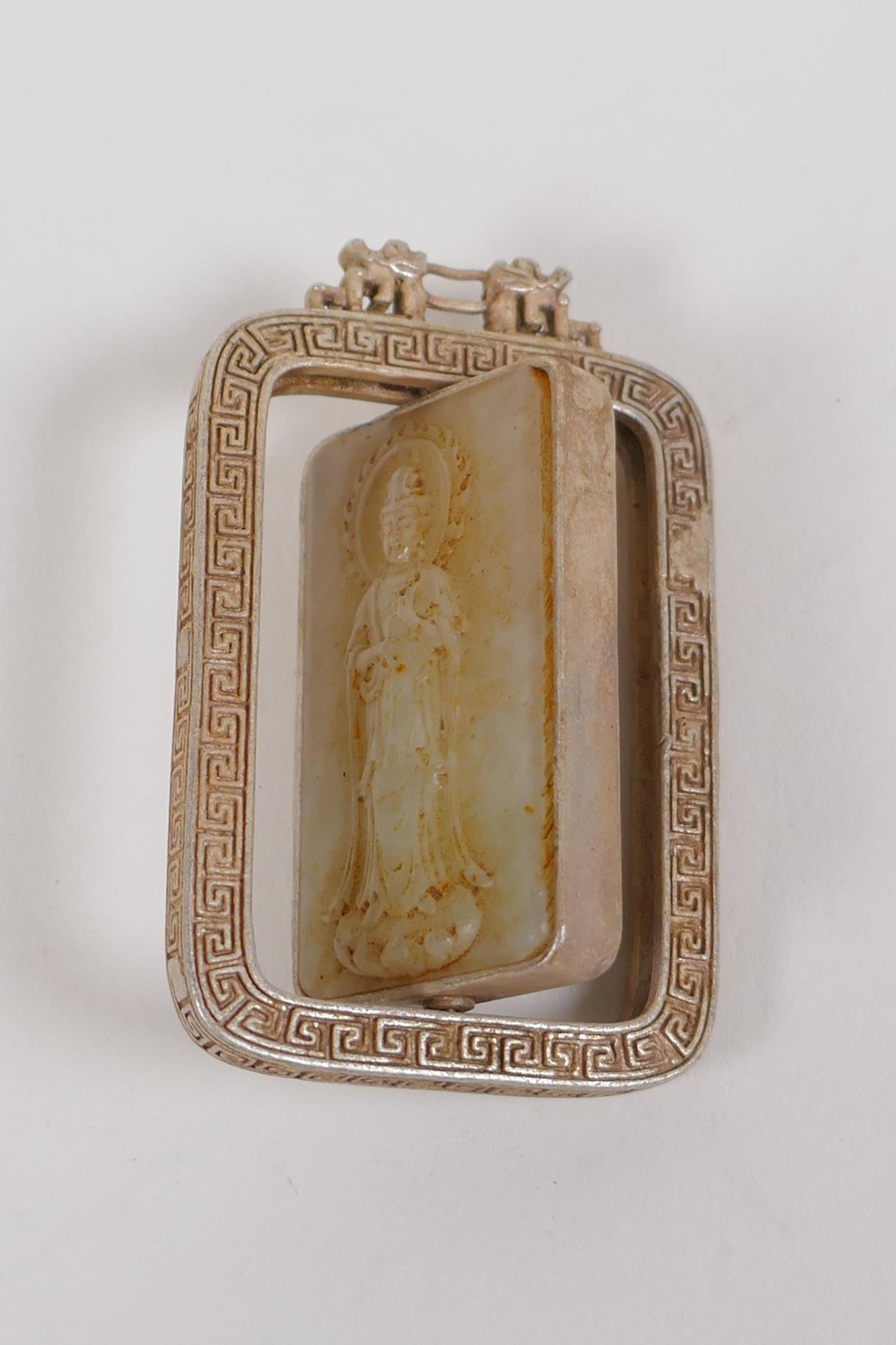 A Chinese white metal pendant set with a jade panel depicting Quan Yin, 4 x 6cms - Image 2 of 2