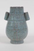 A Chinese celadon Ge ware vase with two lug handles, 12cm high