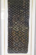 An African Congolese embroidered Kuba textile, framed, 47 x 117cms