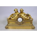 A large C19th French gilt bronze mantel clock, the enamel dial inscribed Robin Her du Roi, Paris,