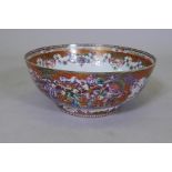 A C19th Chinese export rose mandarin punch bowl, AF, broken, repaired, 33cm diameter