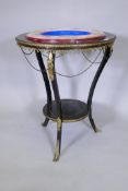 A C19th two tier ebonised centre table, with brass, mother of pearl and kingwood inlaid