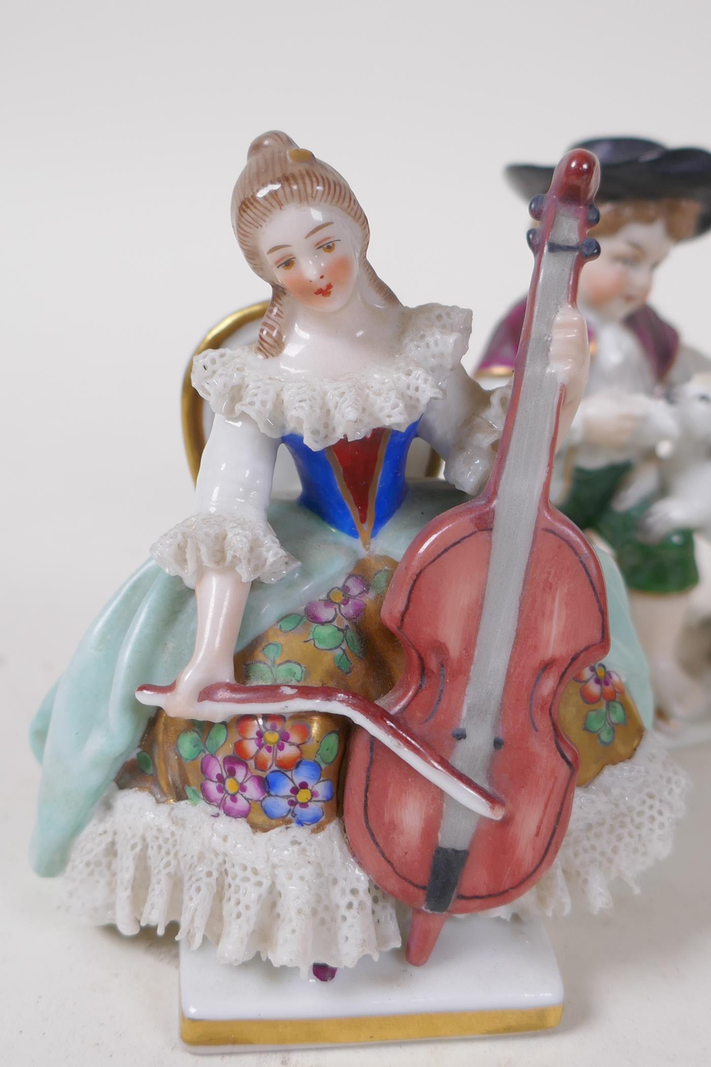 A C19th German porcelain figure of a girl with grapes, 13cm high, and four other continental - Image 2 of 6