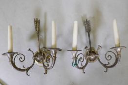 A pair of silver plated two branch wall sconces in the form of horns, 37 x 35cms