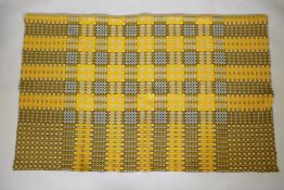 A vintage Welsh yellow ground wool blanket with a Caernarfon portcullis design, 170 x 210cms