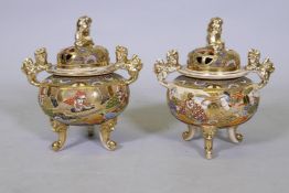 A pair of Meiji Satsuma koro with painted and gilt decoration, AF repairs, 26cm high