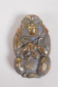 A brass vesta case in the form of a monkey, 7cm high