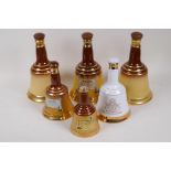 Six Bells ceramic whisky decanters, three Copeland, one Royal Doulton and two Wade