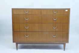 A 1970s Meredew teak chest of drawers, two short over three long, 122 x 55cms, 93cm high