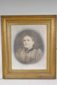 A large photograph of an Edwardian lady in a good quality moulded gilt picture frame, aperture 41