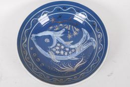 Vera Tollow studio pottery shallow bowl, decorated with a fish, signed and marked Barnes Lodge No