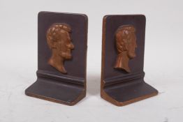 A pair of bronzed cast iron Abraham Lincoln book ends, 11 x 15cms