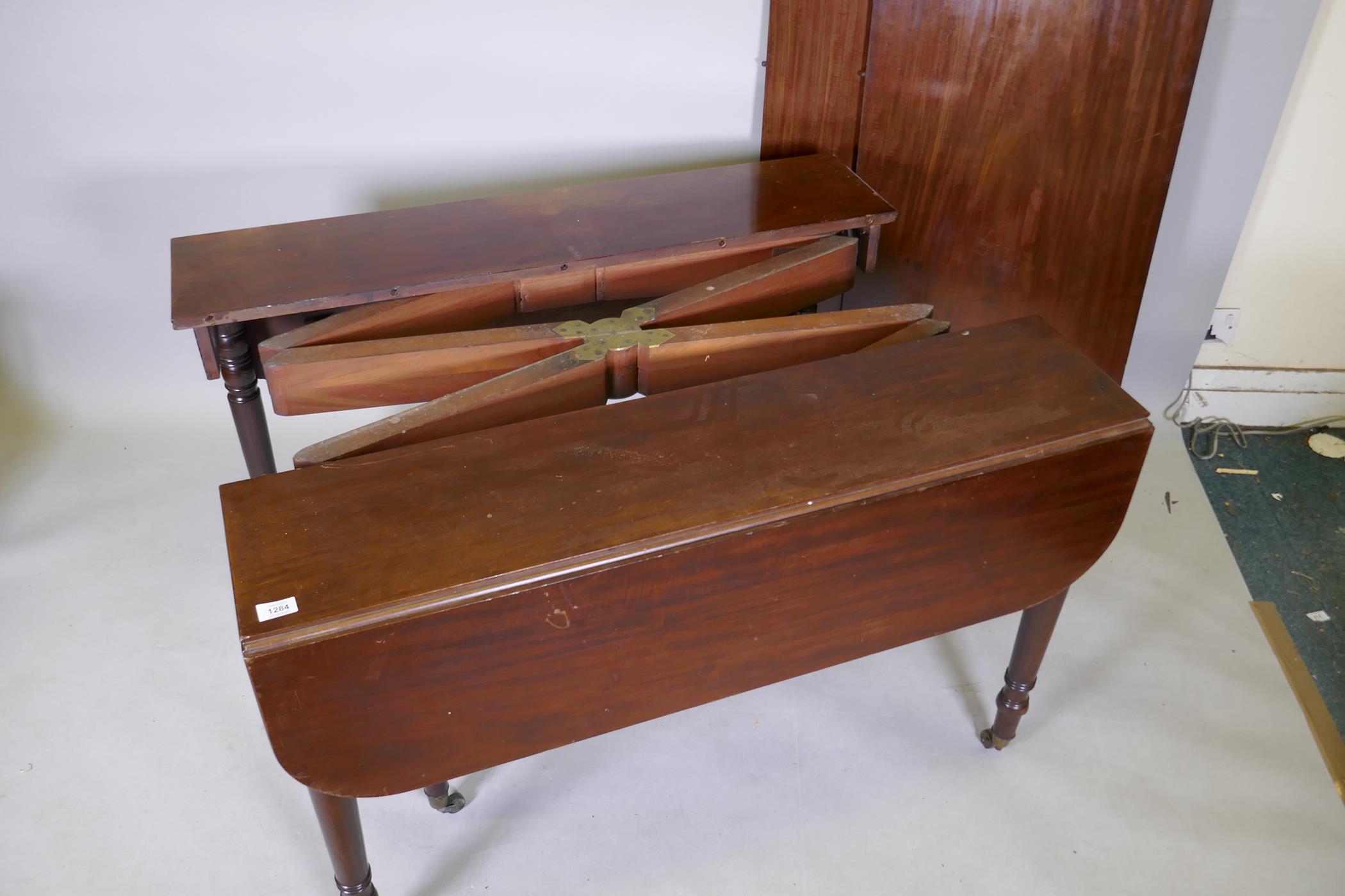 A C19th mahogany drop leaf dining table with concertina action and two extra leaves, one leg AF, 112 - Image 2 of 5