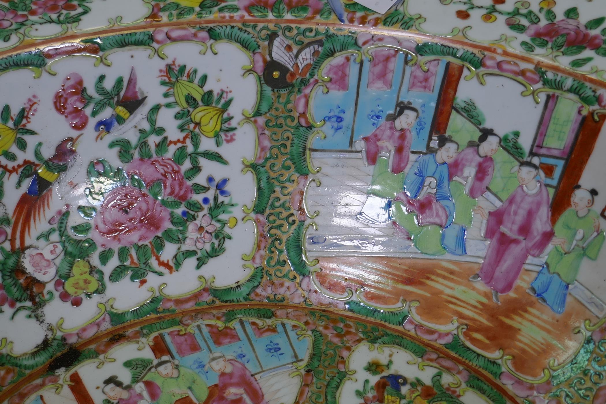 A C19th Cantonese famille rose ceramic bowl, decorated with birds, butterflies and figures, 47cm - Image 2 of 7