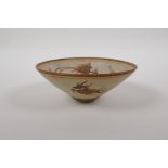 A Chinese Cizhou kiln conical bowl with phoenix, deer and floral decoration, 14cm diameter