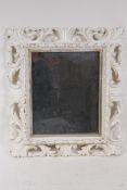 A C19th French carved and painted mirror, with period glass, 37 x 43cms