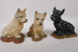 Two painted Spelter figures of West Highland terriers, and a similar Scottie dog, 22cm high