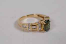 A 14ct yellow gold tourmaline and diamond set ring, size P/Q